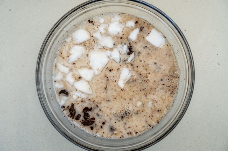 Pouring the coconut milk over the chocolate