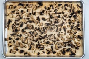 Removing the mushrooms from the oven
