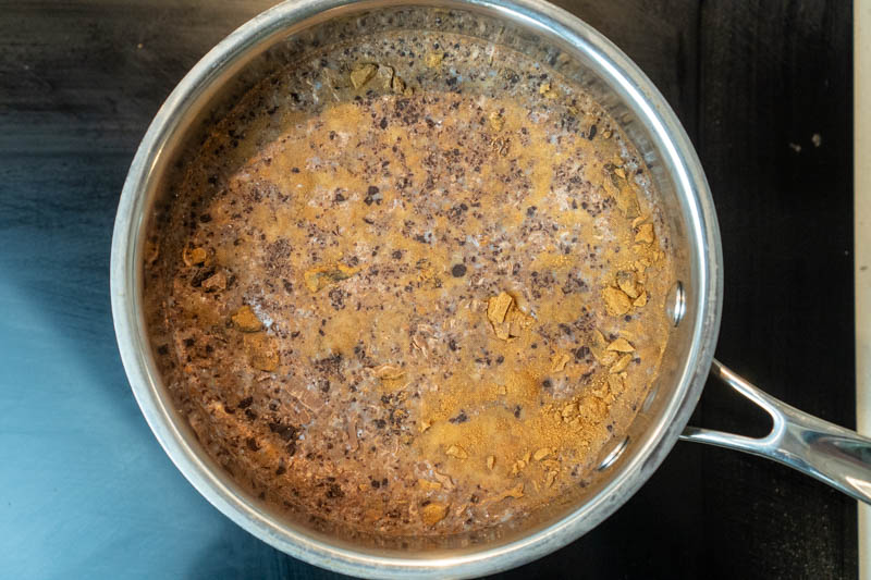 Adding the milk & water to pot