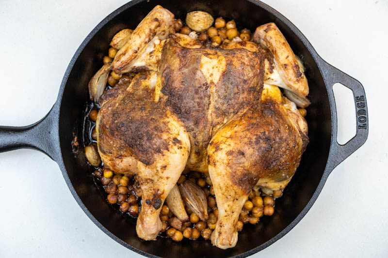 Removing the chicken from the oven