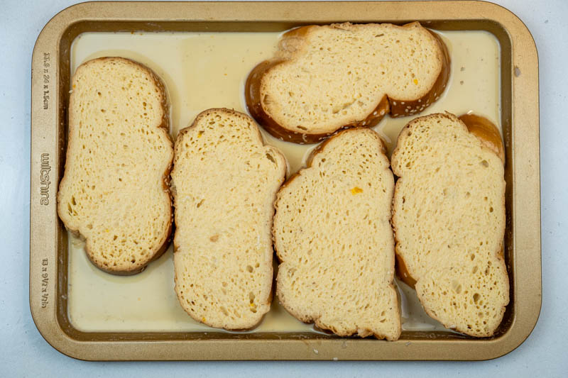 Pouring the custard over the bread