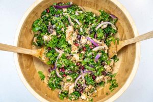 Tossing the salad together