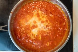 Adding the parmesan cheese