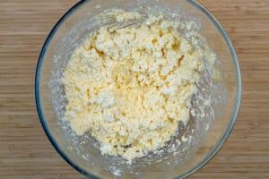 Mixing the tvorog, eggs & sugar