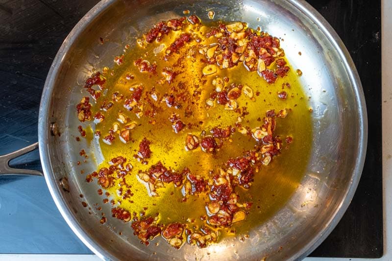 Adding the tomato paste