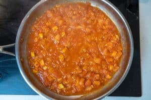 Cooking down the tomatoes