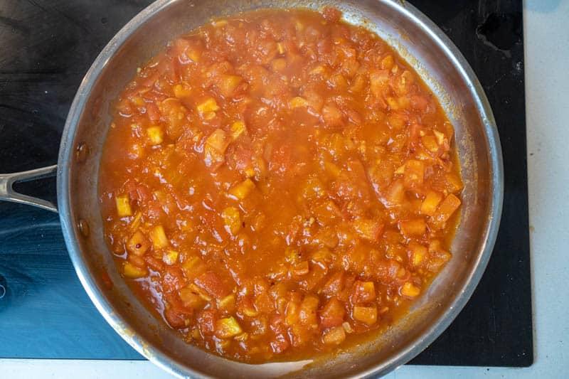 Cooking down the tomatoes