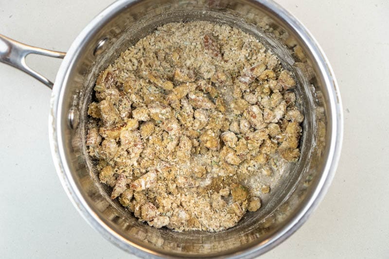 Stirring in the flour, parmesan and sage
