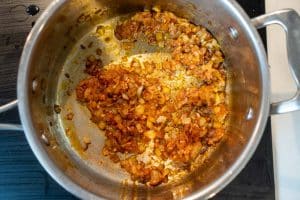 Adding the garlic, tomato paste & lemon