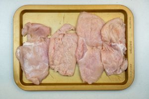 Seasoning the chicken