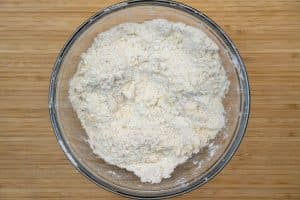 Adding the butter to the flour
