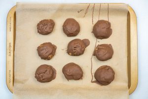 Coating the balls in chocolate