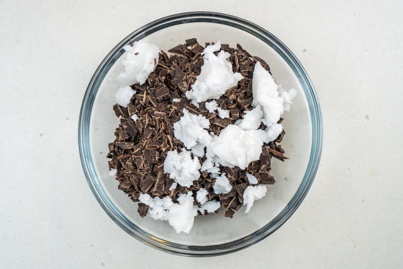 Adding the chocolate & coconut oil to a bowl