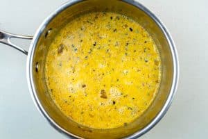 Adding the evaporated milk