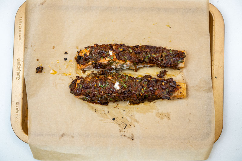 Removing the salmon from the oven